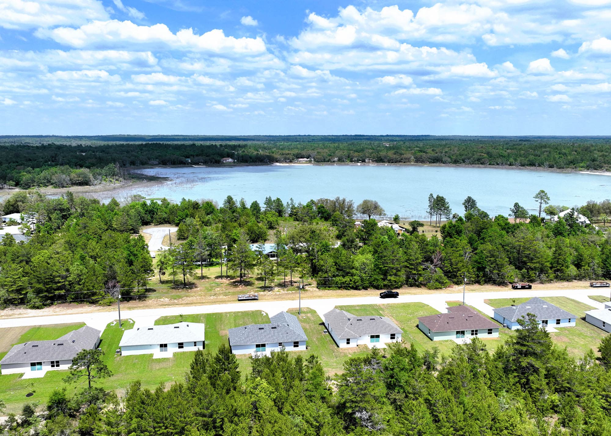 Modern residential homes with views toward a waterfront area in Washington County, Florida.